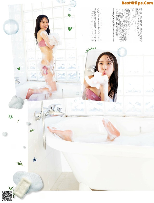 A picture of a woman taking a bath in a bathtub.